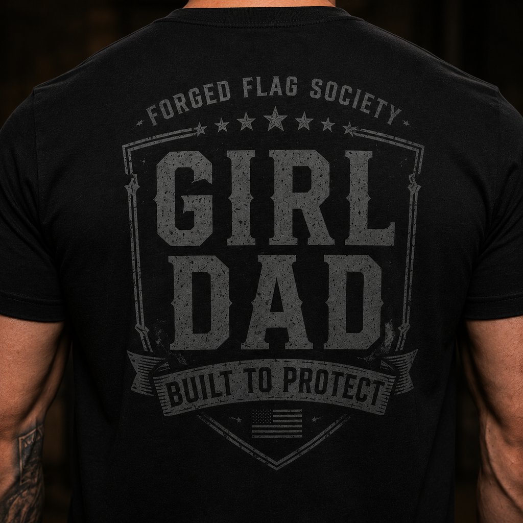 Black t-shirt with 'Girl Dad' text and 'Forged Flag Society' branding on a dark background