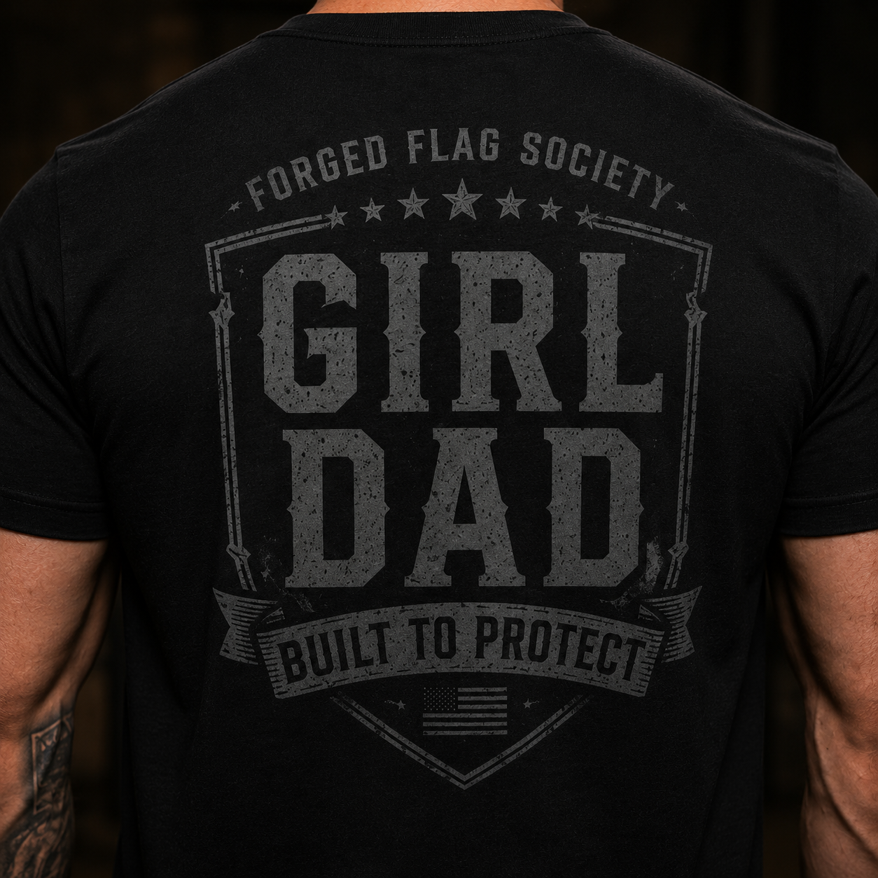 Black t-shirt with 'Girl Dad' text and 'Forged Flag Society' branding on a dark background